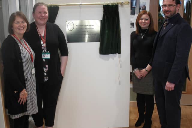 Lorraines children, Helen and Robert, unveiling the plaque, along with Chief Executive and Principal, Alison Robinson, and Head of Veterinary Nursing and Farriery, Claire Bloor.