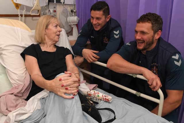 Wigan Warriors stars visiting patients at Rosemere's Ribblesdale ward
Kete Devine with Morgan Escare and Sean O'Loughlin