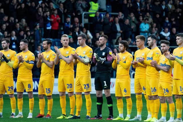 PNE players take part in a minute's applause ahead of the QPR game