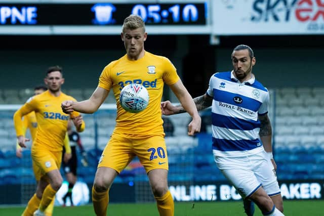 Preston striker Jayden Stockley shields the ball against QPR