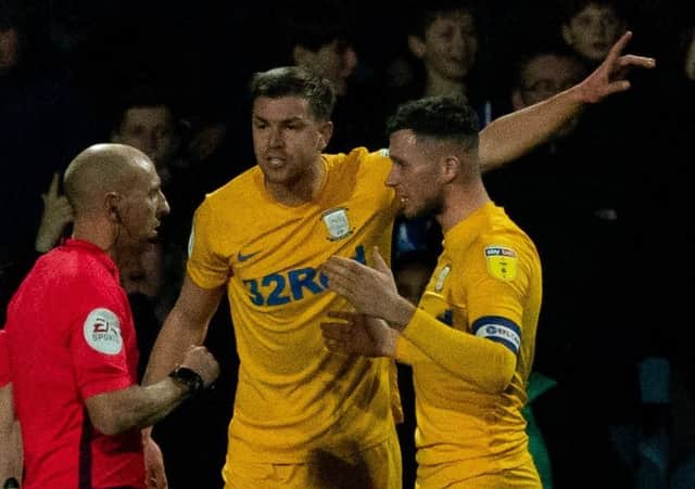 Paul Huntington and Alan Browne question referee Andy Davies' penalty decision