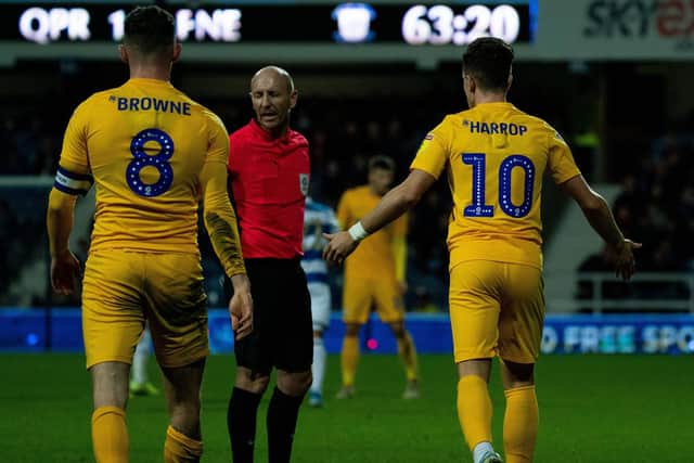 Alan Browne and Josh Harrop protest to referee Andy Davies