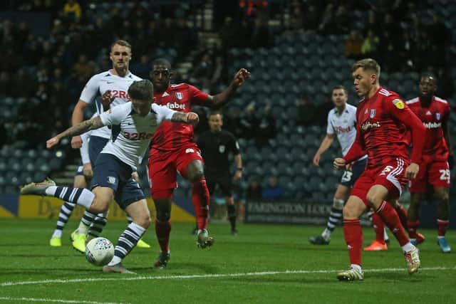 Sean Maguire pulls the trigger for Preston's first goal against Fulham