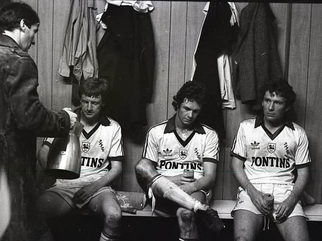 Graham Bell, Steve Eliiott and Don O'Riordan look despondent in the dressing room after Preston are relegated in May 1981 despite their win against Derby at the Baseball Ground