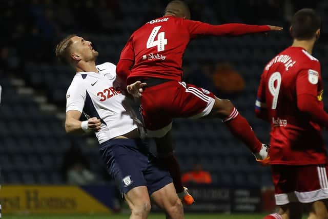 Patrick Bauer is caught in the face by Fulham's Denis Odoi