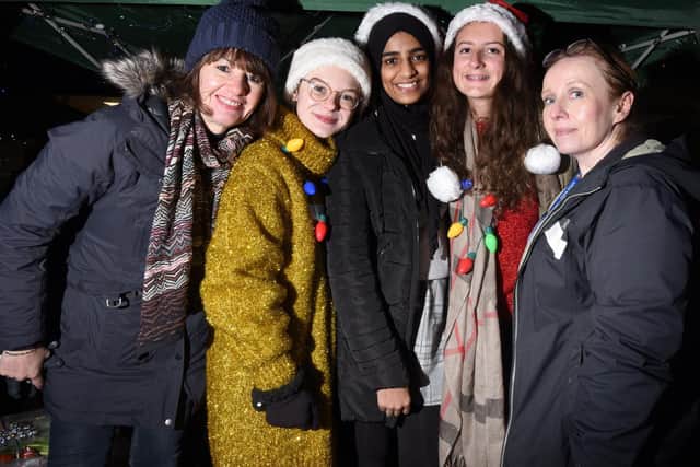 From left, headteacher Karen Pomeroy, pupils Suzanna, Misbah and Mia, with deputy headteacher Sharon Hall, raise funds for schools in Africa at the annual Penwortham Christmas market.