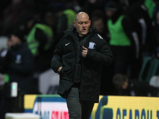 Preston manager Alex Neil jogs to the dressing room at half-time of the 2-1 win over Luton