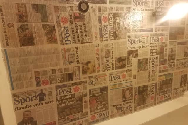 Lostock Ale's ceiling is covered in Lancashire Evening Post news clippings.