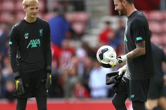 Liverpool goalkeeper Caoimhin Kelleher with ex-Preston North End goalkeeper Andrew Lonergan