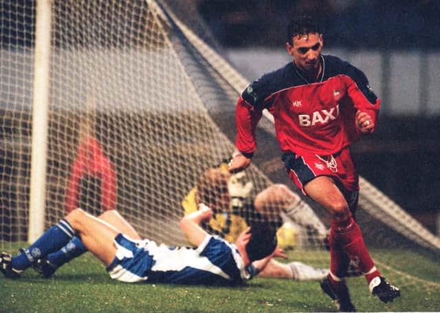 Kurt Nogan turns to celebrate after scoring Preston's third goal in their 4-0 win over Cardiff at Ninian Park in January 2000