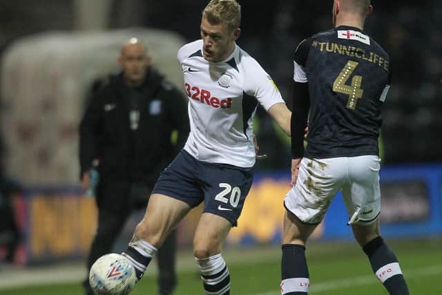 Jayden Stockley tries to take the ball past Luton substitute Ryan Tunnicliffe