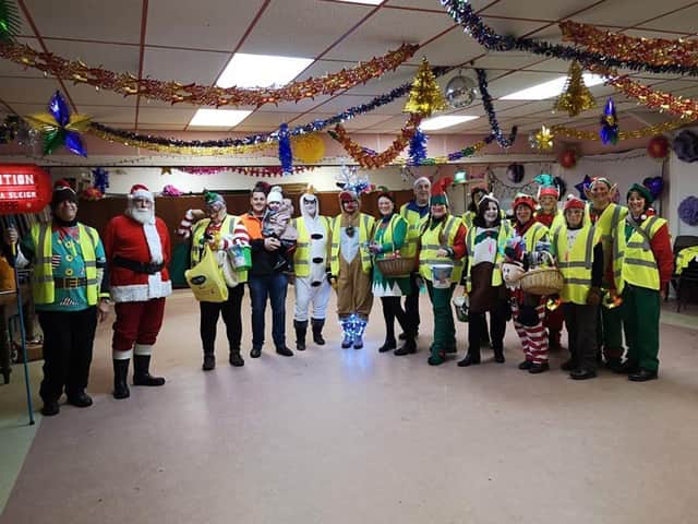 Volunteers at Gregson Green Community Centre's SantaSleighCollection last year.