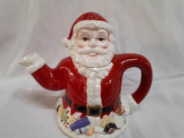 This jolly Santa teapot would brighten any Christmas table