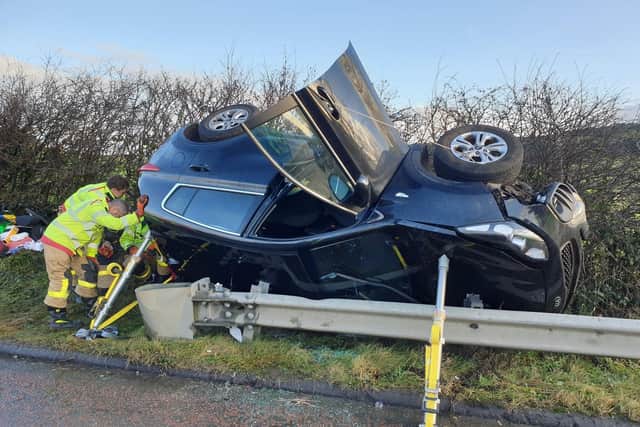 A woman has been taken to hospital after her Kia 4X4 overturned following a collision with a HGV on the M6 near Lancaster at 9.15am (December 19). Pic: Lancashire Police