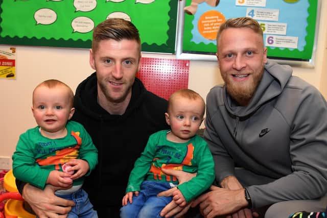 Preston players Paul Gallagher and Tom Clarke with Albie and Kobie Shaw at the Royal Preston Hospital