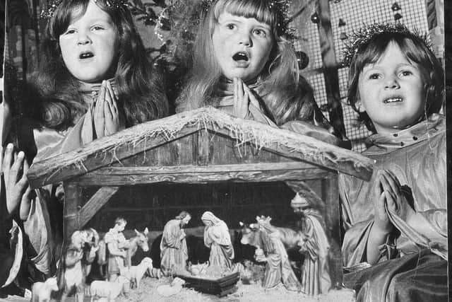Wonder of Christmas captured in the faces of a mini-choir at Preston's Isherwood Street nursery in 1969. Pictured are four-year-olds Maureen McKay, Beverley Black and Kathren Singleton