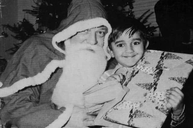 Santa Claus visits the Goss Christmas party in Preston in 1969