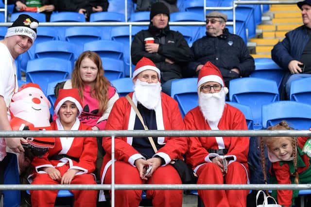 Preston supporters in a Christmas mood at Cardiff