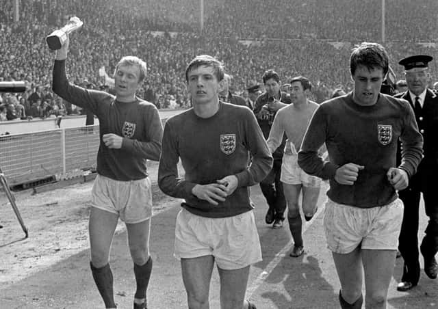Martin Peters (centre) with Bobby Moore and Geoff Hurst