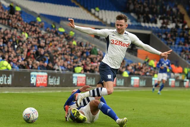 Preston midfielder Alan Browne is tackled in the 0-0 draw at Cardiff