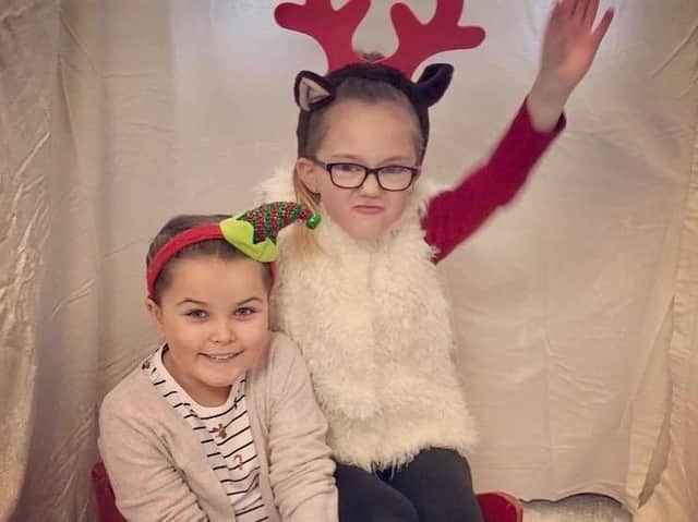Olivia Reid and Kaci Cuerden at the Christmas fair hosted by Footprints at School Nursery, Bamber Bridge.