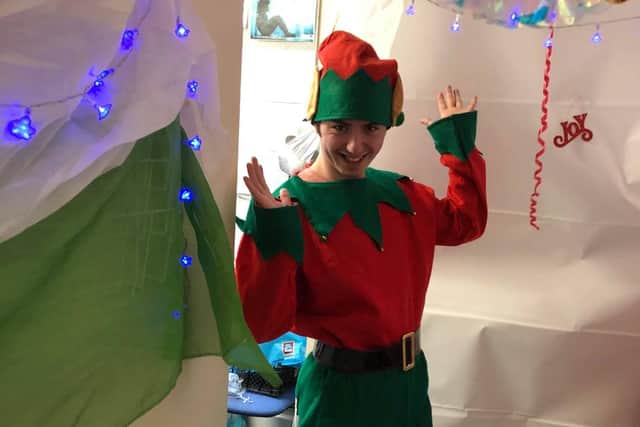 Damon Betts gets into the festive mood, dressed as an elf.