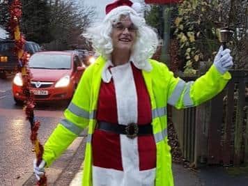 Nina said she began to dress up for her crossing patrols because she wanted to "spread Christmas cheer" and "make people smile"