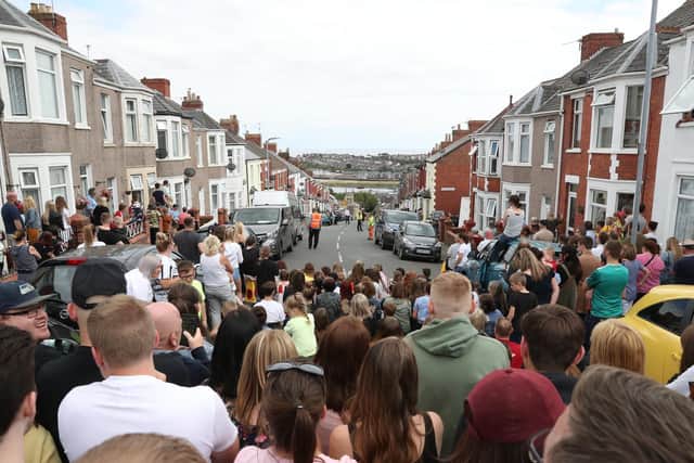 Crowds gather to watch filming for the Gavin and Stacey Christmas special at Barry in the Vale of Glamorgan, Wales.
