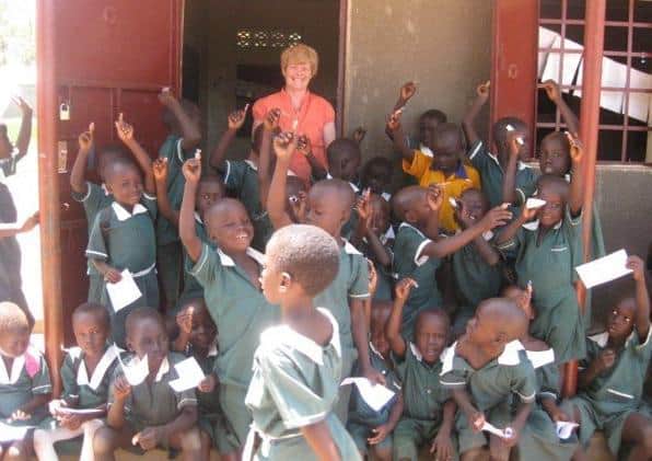 Carolyn Murray with children in South Sudan.