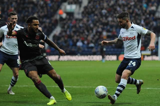 Preston's Sean Maguire has a run at goal against Reading