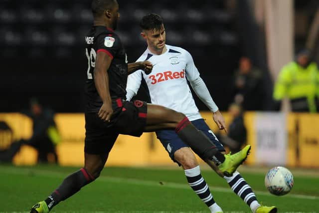 Preston left-back Andrew Hughes clips the ball down the line