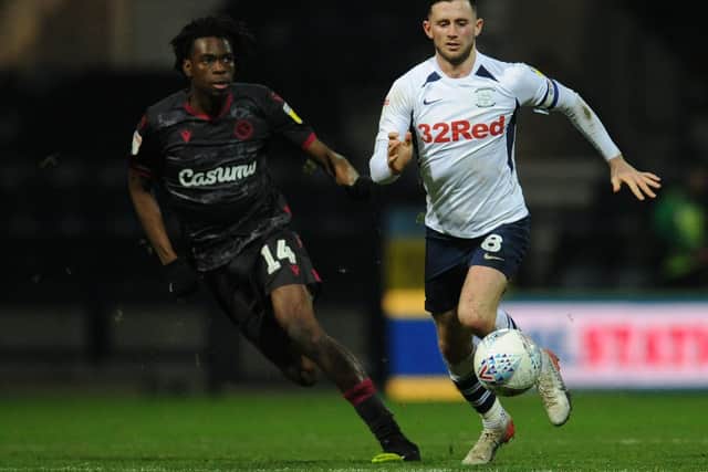 Preston midfielder Alan Browne gets ahead of Reading's Ovie Ejaria