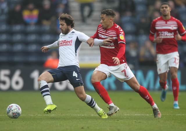 Ben Pearson battles with  Middlesbrough's Marcus Tavernier