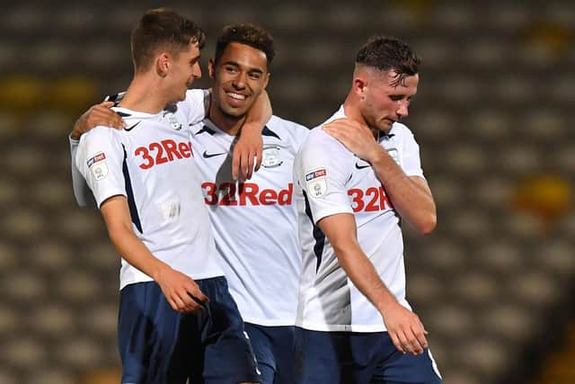 Andre Green is congratulated by Tom Bayliss and Alan Browne after scoring for Preston against Bradford