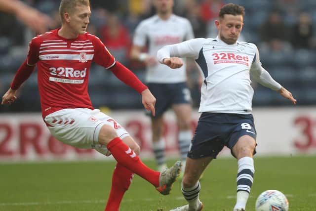 Alan Browne competes with George Saville during PNE's defeat to Middlesbrough