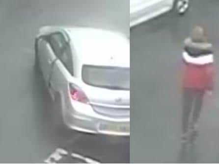 Police are looking to identify the driver of the car, believed to bea Vauxhall Astra, as well as the woman in the red jacket. (Credit: Lancashire Police)