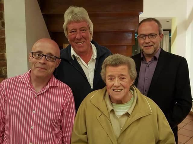 Phyllis Hutton, of St Annes, with her sons Gordon, Alan and Iain