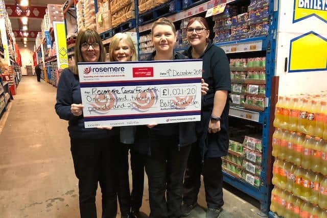 Sophie Johnson (second right) with colleagues at Batleys in Preston, who have raised funds for Rosemere Cancer Foundation
