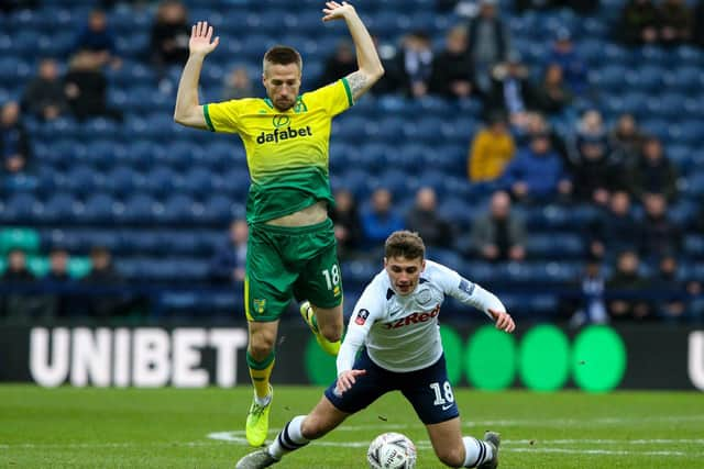 Preston midfielder Ryan Ledson goes down under Marco Stiepermann's challenge