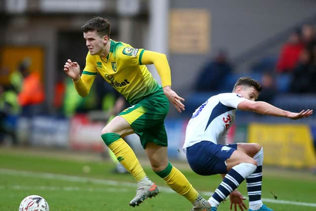 Norwich right-back Sam Byram gives Preston's Josh Harrop the slip at Deepdale