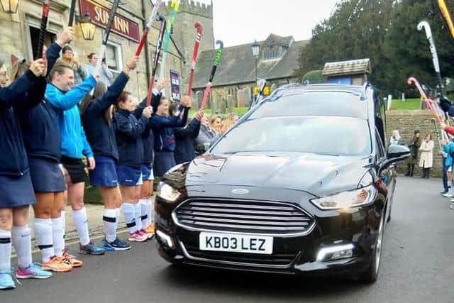 Hundreds of mourners lined the streets to pay their respects whilst Longridge Hockey Club made a guard of honour as Katys hearse passed through her hometown of Chipping in the Ribble Valley. Pic: Lucy Blezard