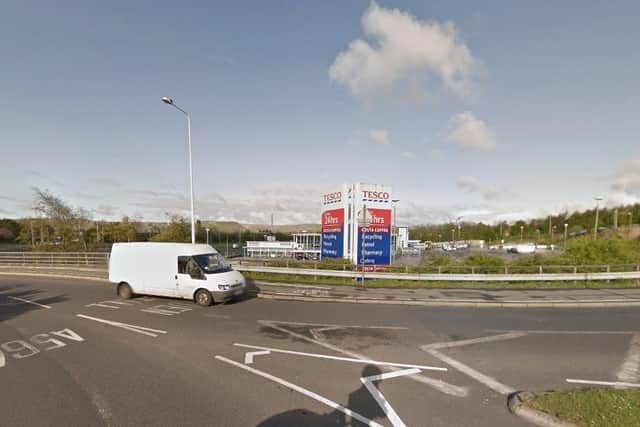 The A56 in Haslingden has been closed in both directions near Tesco after a man was reported to have fallen from a bridge on the Woolpack roundabout. Pic: Google