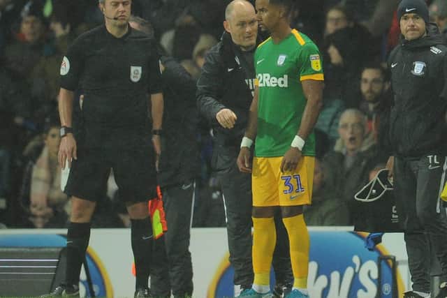 Scott Sinclair gets instructions from Alex Neil before being introduced for his Preston debut against Blackburn