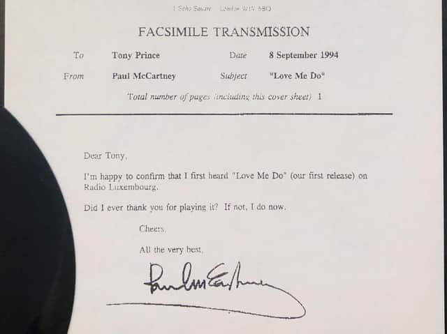 The note with the first Beatles record to be played on the radio which is being sold by the auction house on January 28 - complete with the misspelling of Sir Paul McCartney's name.