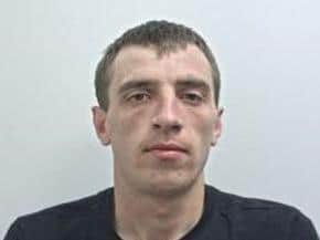 Aaron Scott (pictured) is described as 5ft10in to 6fttall, thin build, short brown hair and blue eyes. (Credit: Lancashire Police)