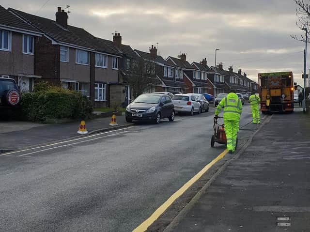 Yellow lines being put on Broadwood Drive previously