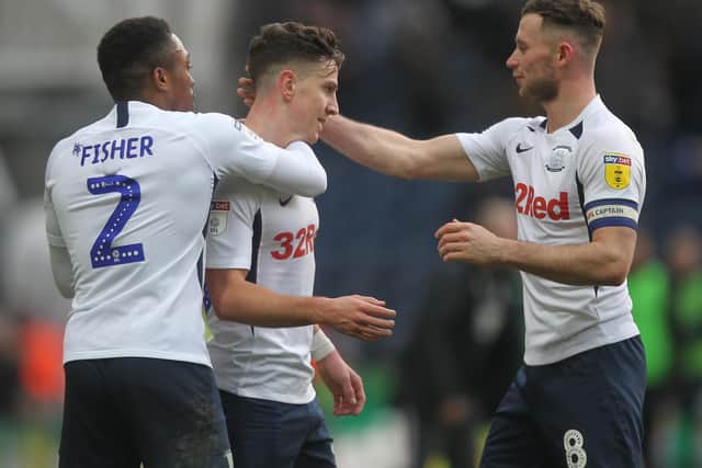 Josh Harrop is congratulated by Darnell Fisher and Alan Browne after equalising for Preston against Charlton