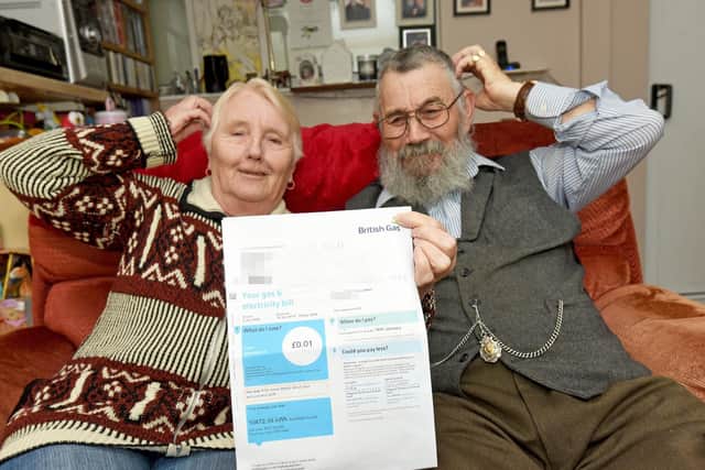 Tom and Margaret Anne McMellon with their bill for 1p from British Gas. Pictures: Daniel Martino