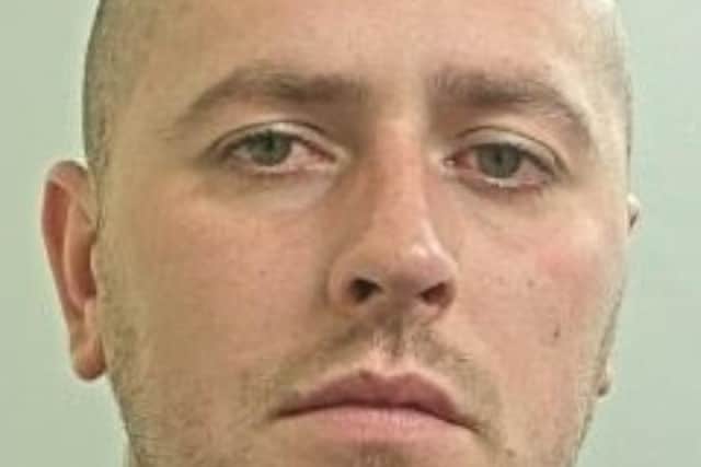 Jack Haddon, 28, from Chorley, had been wanted by police in connection with offences of harassment, assault, criminal damage and coercive behaviour. Pic: Lancashire Police