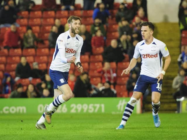 Tom Barkhuizen celebrates with Josh Harrop after giving Preston thye lead at Barnsley